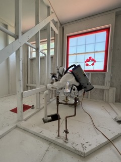 Technician fitting replacement glass window