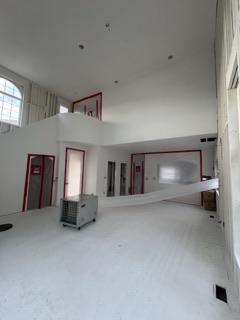 Commercial fire restoration team cleaning an office building in Denver