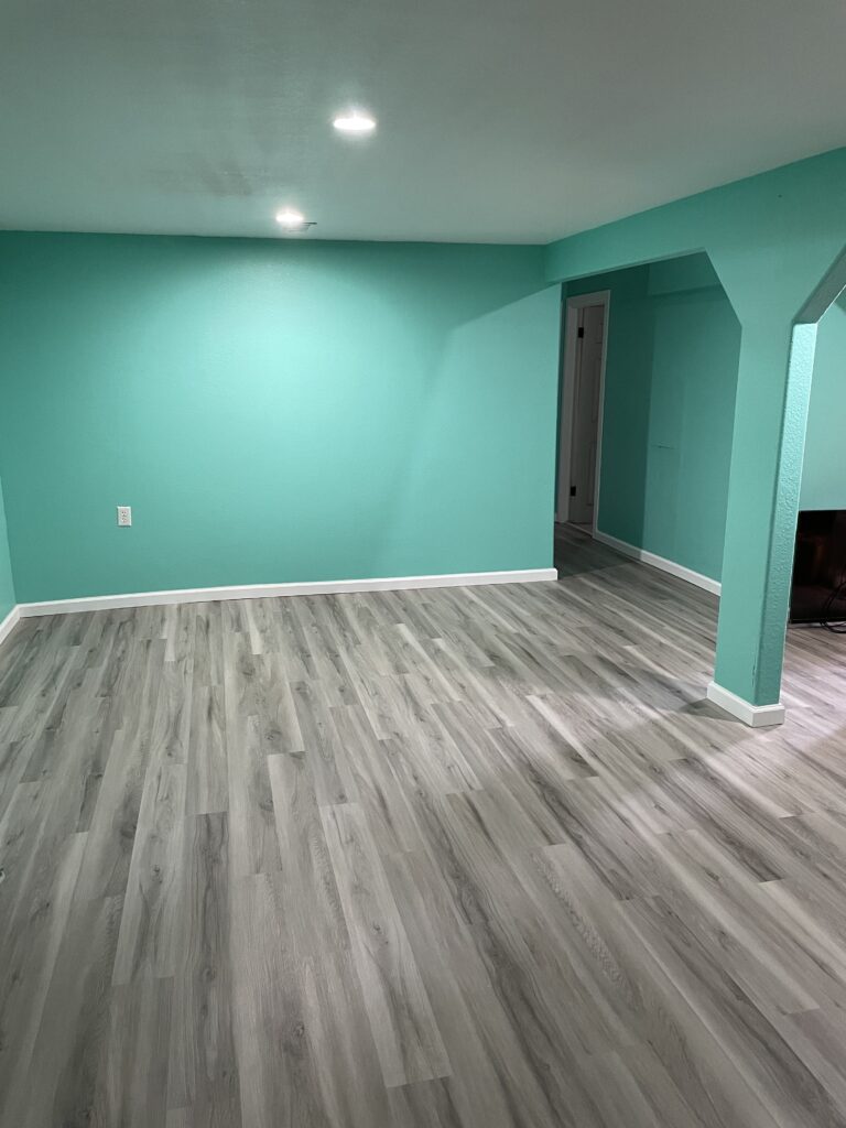 A commercial construction site showing steel framing, advanced tools, and professional workers.